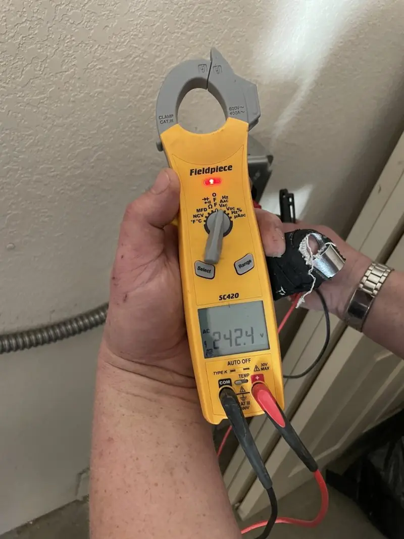 Voltage testing with clamp meter during Generator Installation in Hermantown